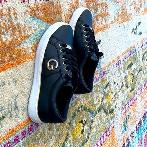 Black and gold G by GUESS shoes